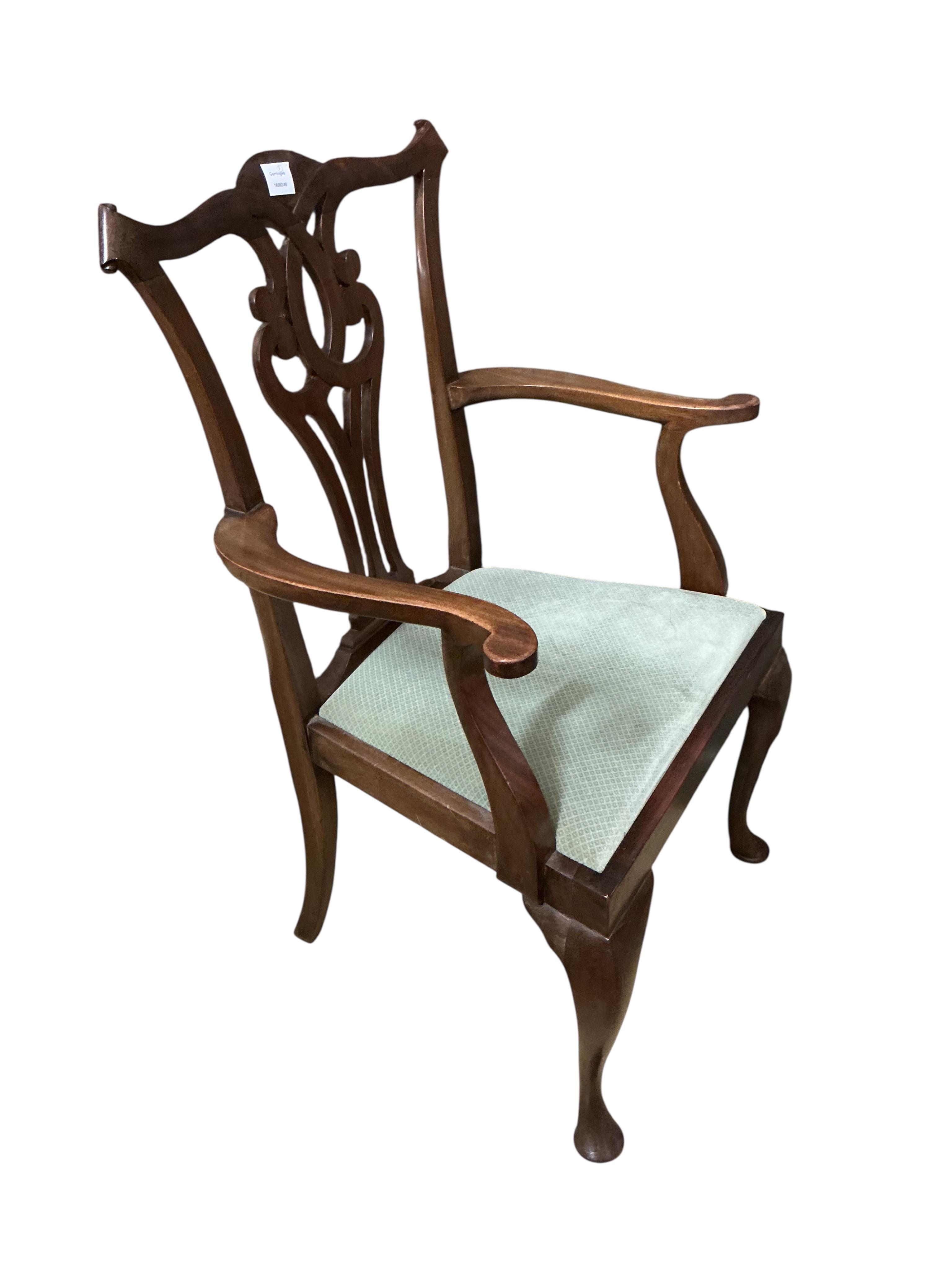 A set of eight George III style mahogany dining chairs, two with arms